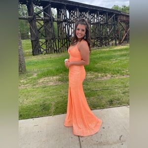 Super comfortable!! Wore 1 time, perfect condition,more peachy than orange.